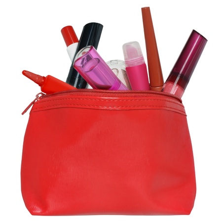 Red bag for cosmetics with a make-up accessories.の写真素材