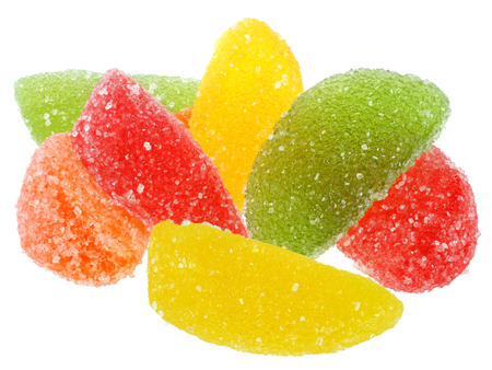 Heap multicolored candy on a white background.の写真素材