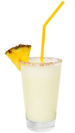 Cocktail pina colada with pineapple slice on a white background.の写真素材