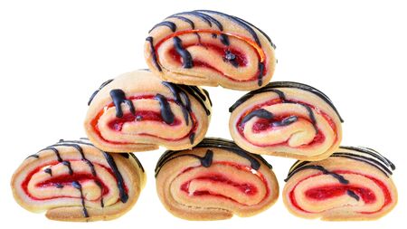 Cookies rolls with strawberry jam and chocolate icing isolated on a white background.の写真素材