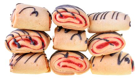 Cookies rolls with strawberry jam and chocolate icing isolated on a white background.