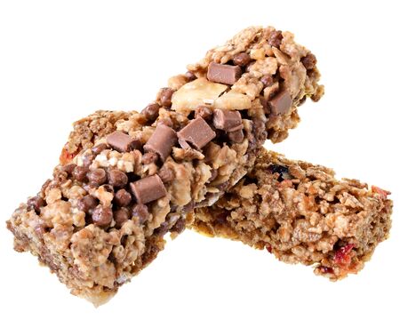 Cereal bars with chocolate, banana and strawberries isolated on white background.の写真素材