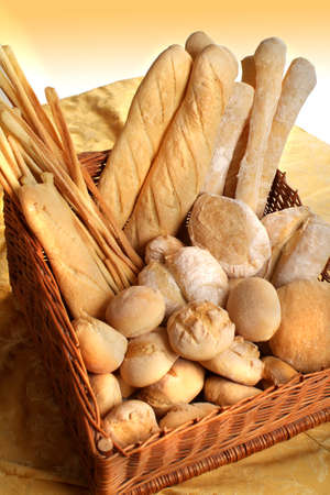 Italian food products, basket with some different wheat bread.