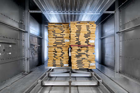 Industrial oven for wood seasoning