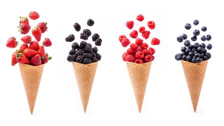 lively and colorful variety of berries in ice cream cones