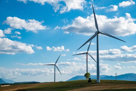 solar countryside landscape with wind generators