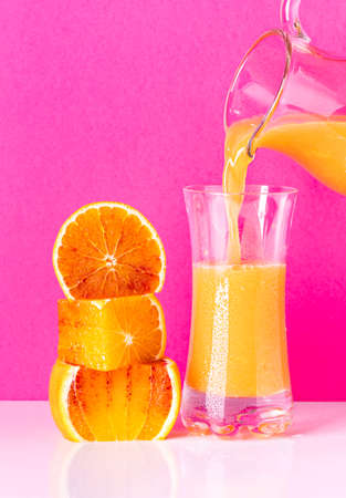 Freshly squeezed orange juice isolated from the background.の写真素材