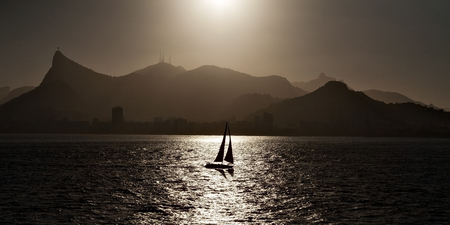 Sailing boat backlit in Rio de Janeiroの写真素材