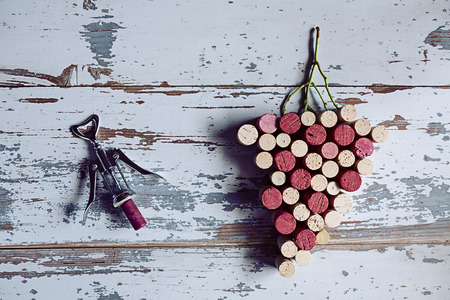Corks grapes and corkscrewの写真素材