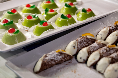Sicilian cassata and cannoli, a traditional sweet from Sicily, Italyの写真素材