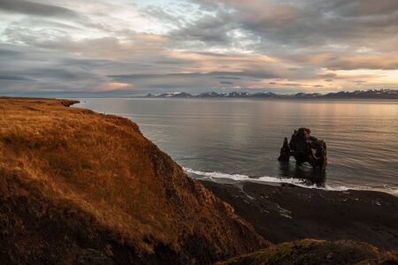 Hvitserkur the famous rock in the ocean in Iceland at sunriseの写真素材