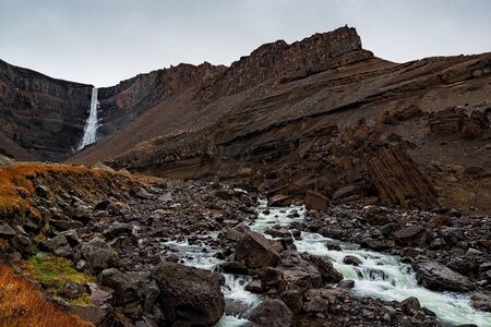 Hengifoss waterfall in eastside of Iceland in a cloudy dayの写真素材