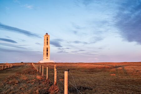 Knarraros lighthouse in rural area near Stokkseyri, Icelandの写真素材
