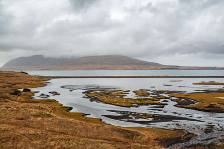 View of Hvalfjordur in a summer cloudy day, Icelandの写真素材
