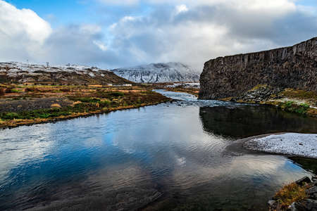 View on the right side of Hjalparfoss, a waterfall in the southern highlandsの写真素材