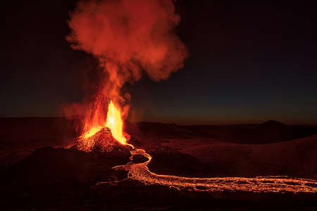 Fagradalsfjall volcanic eruption in the night before sunrise in Reykjanes peninsula around 40 kilometers from Reykjavik, Icelandの写真素材
