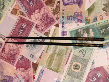 Chinese Money and shopsticksの写真素材