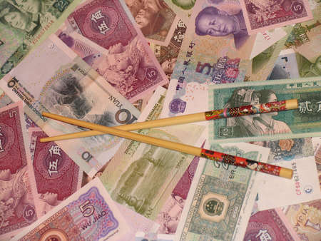 Chinese Money and shopsticksの写真素材