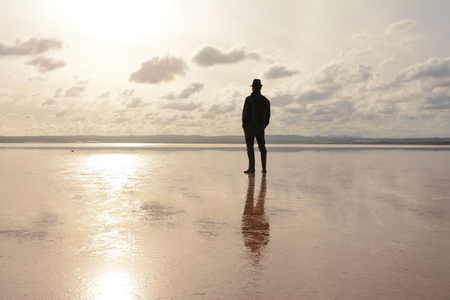 man looking at the horizon