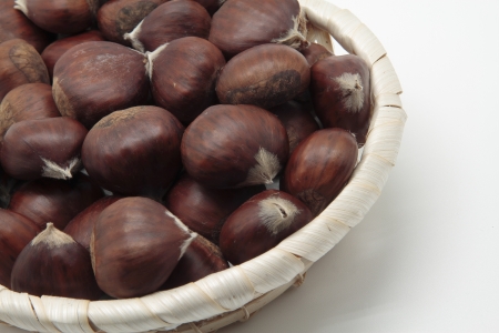 picture of a basket with some delicious chesnutsの写真素材