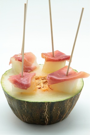 delicious skewers of melon with cured hamの写真素材