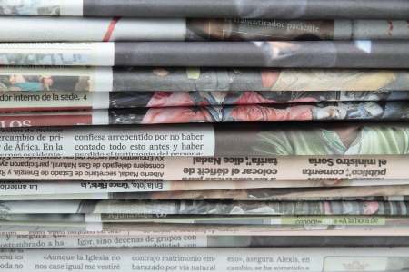 some stacked newspapers
