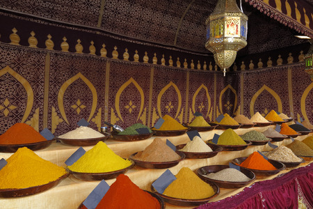some dishes with differents types of spices on a outdoor shop during the celebration of a medieval festivalの写真素材