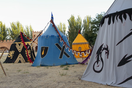 outdoor scene with some tents in the recreation of a medieval military campの写真素材