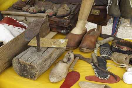 stand with utensils for hand made manufacture of shoes