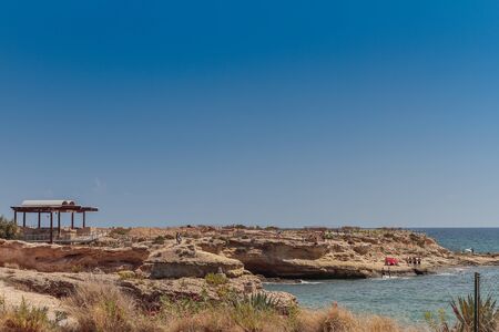 view of the illeta dels banyets in wich they are archeological remains of a fish farm of the roman era in the coastal municipality of el campelloのeditorial素材