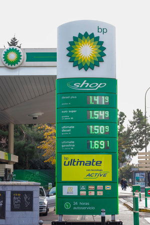 TORREJON DE ARDOZ, MADRID, SPAIN - DECEMBER 1, 2021: foreground of billboard with gasoline prices at...