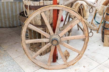 outdoor scene in horizontal view with a tillage wagon wheel in foreground. sustainable economyの写真素材