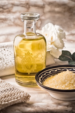 Still life of a bath foam's bottle and bath saltsの写真素材