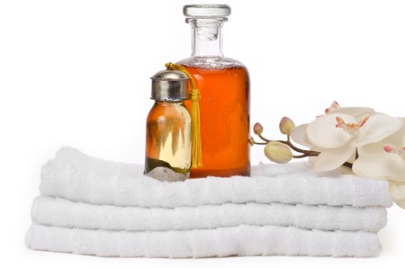 Still life on white background of an elegant bottle od bath foam and oilの写真素材