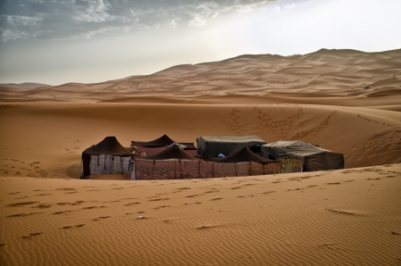 Nomadic tented camp in the Sahara desert, at erg Chebbiの写真素材
