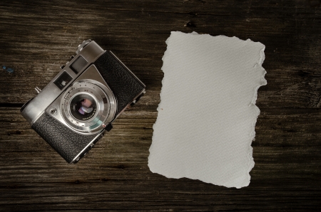 old analog camera witha piece of paper for messagesの写真素材