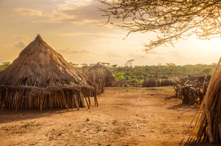 Africa, Ethiopia, in huts in Hamer village in the sunset lightの写真素材