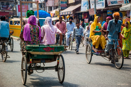 Amritsar, India - 10 August 2008: unidentified persons with different transports in a streets of...