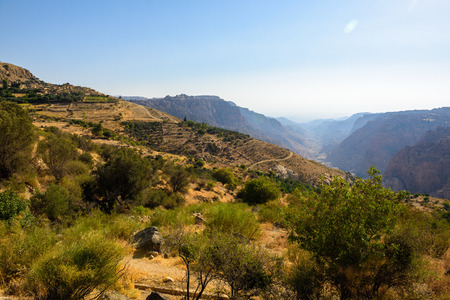 Pathway in the Dana Biosphere Reserve. View of the Valley and the Dana HIstorical Villageの写真素材