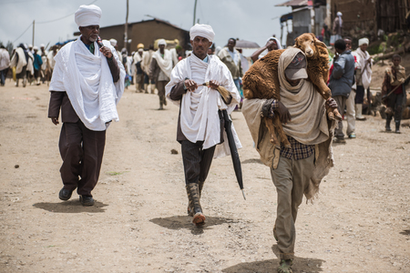 SIMIEN MOUNTAINS, ETHIOPIA - AUGUST 29,2015: crowded weekly market in a small village in Ethiopia....