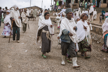 SIMIEN MOUNTAINS, ETHIOPIA - AUGUST 29,2015: crowded weekly market in a small village in Ethiopia. In these markets are sold of kind of goods and animalsのeditorial素材