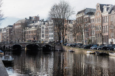 AMSTERDAM, THE NETHERLANDS - JANUARY 20, 2017:  Amsterdam, has more than one hundred kilometers of canals, about 90 islands and 1,500 bridges. The three main canals, Herengracht, Prinsengracht, and Keizersgrachtのeditorial素材