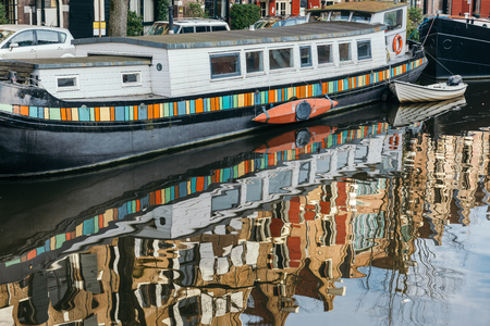 Amsterdam, has more than one hundred kilometers of canals, about 90 islands and 1,500 bridges. The three main canals, Herengracht, Prinsengracht, and Keizersgrachtの写真素材