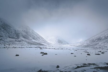 Himalayan winter landscape in Ladakh, India, during a snowy dayの写真素材