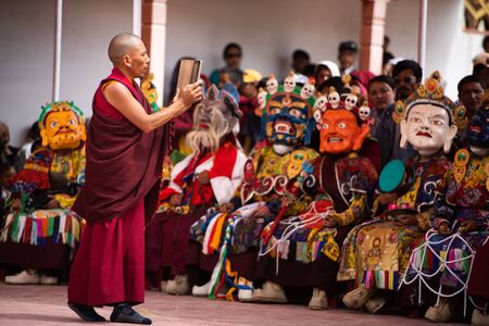 Buddhist Monk registering a videoのeditorial素材