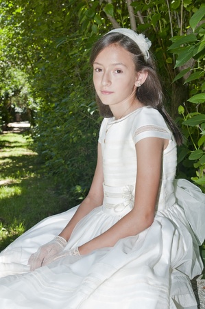 girl white dress the day of their first communionの写真素材