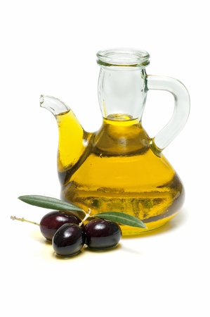 olive oil and fresh olives on white backgroundの写真素材