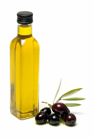 olive oil and fresh olives on white backgroundの写真素材