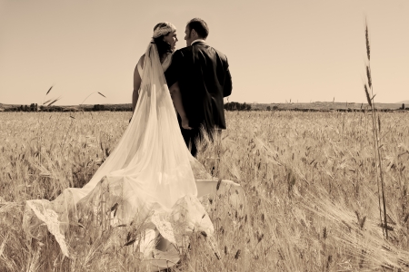 Beautiful bride and loving groom on their wedding dayの写真素材