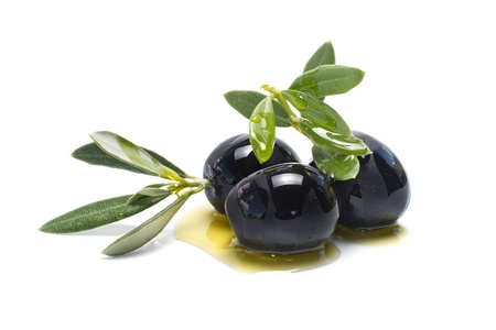 fresh olives isolated on white backgroundの写真素材
